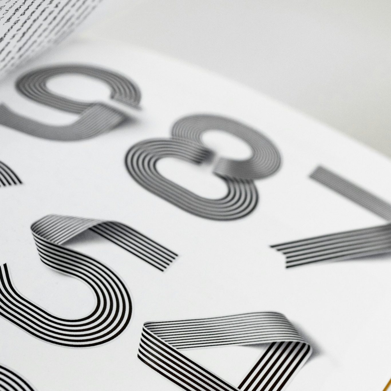 Close-up of a black and white brand identity design.